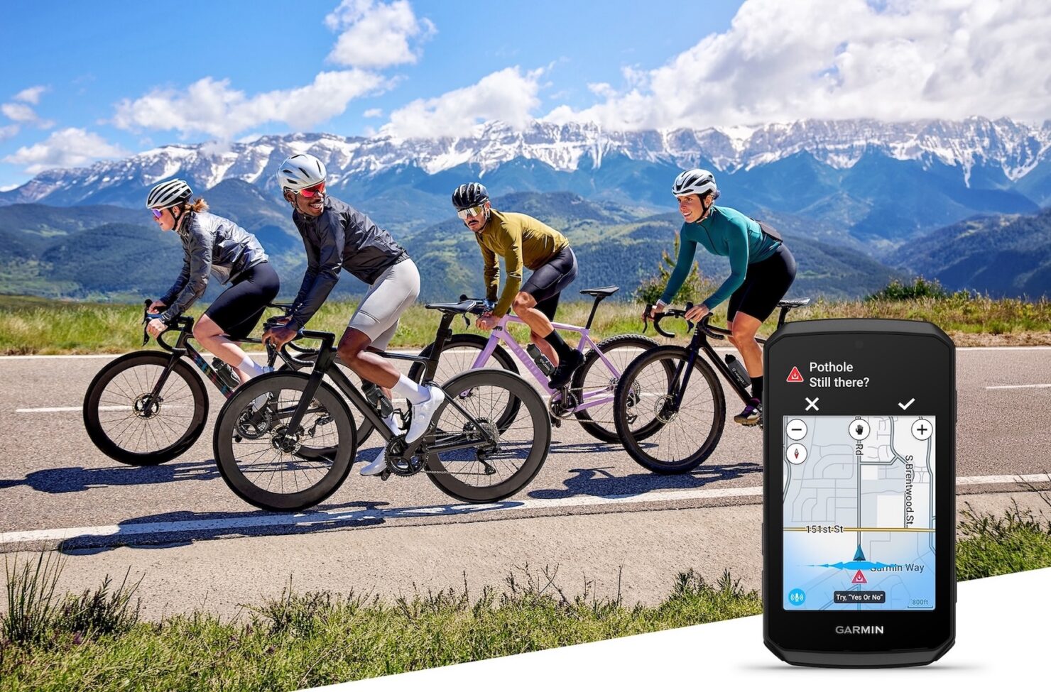 Garmin Edge 1060 à écran couleur affichant une alerte routière devant des cyclistes en montagne