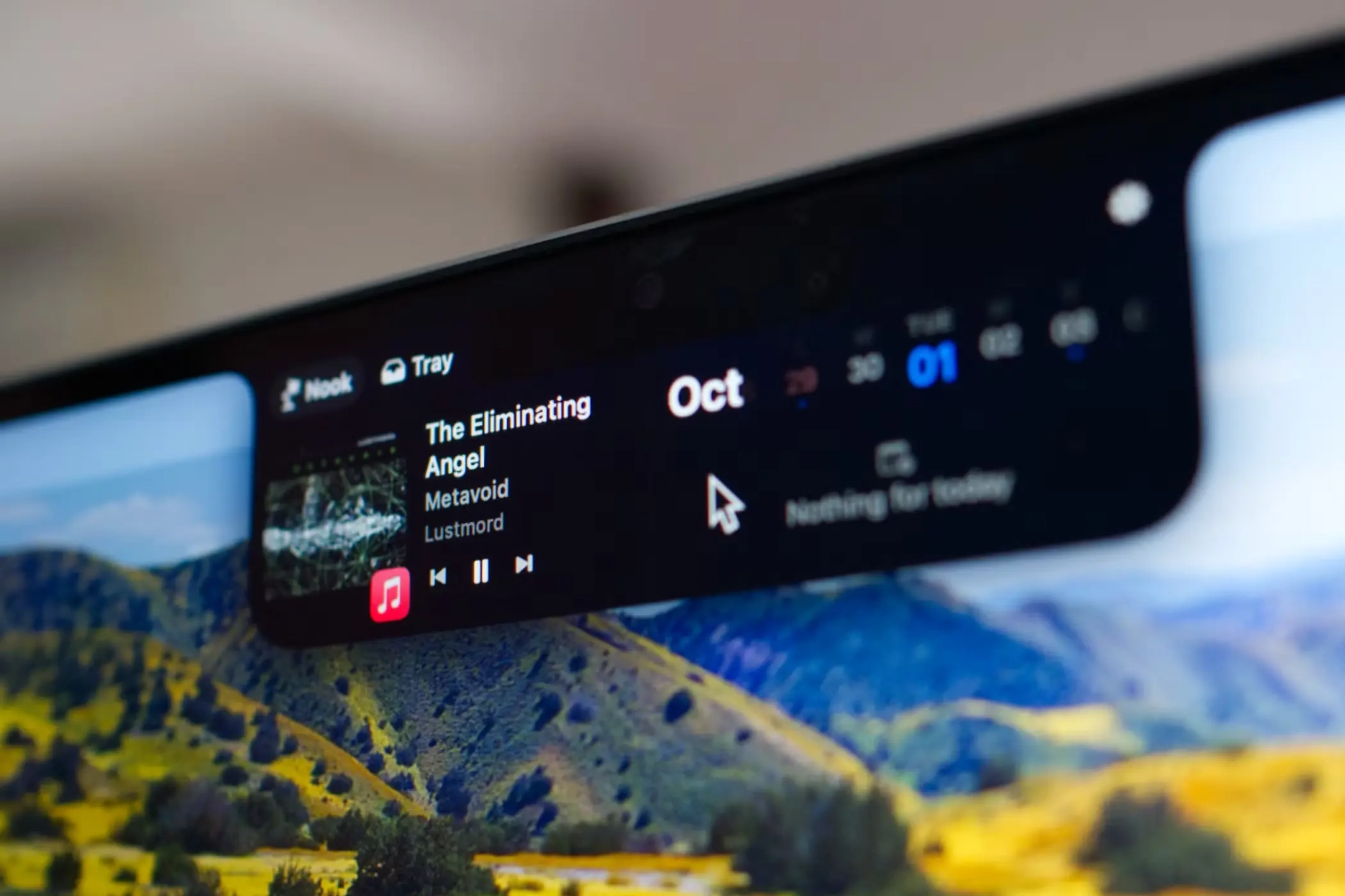 Dynamic Island autour de l’encoche d’un MacBook avec Notchy