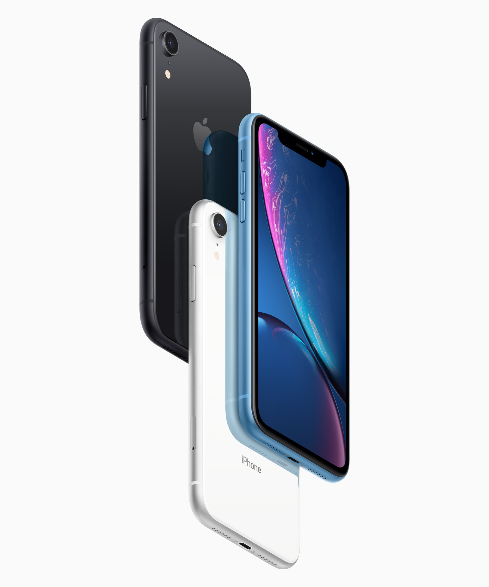Trois iPhone XR présentés en noir, blanc et bleu, visuel officiel Apple
