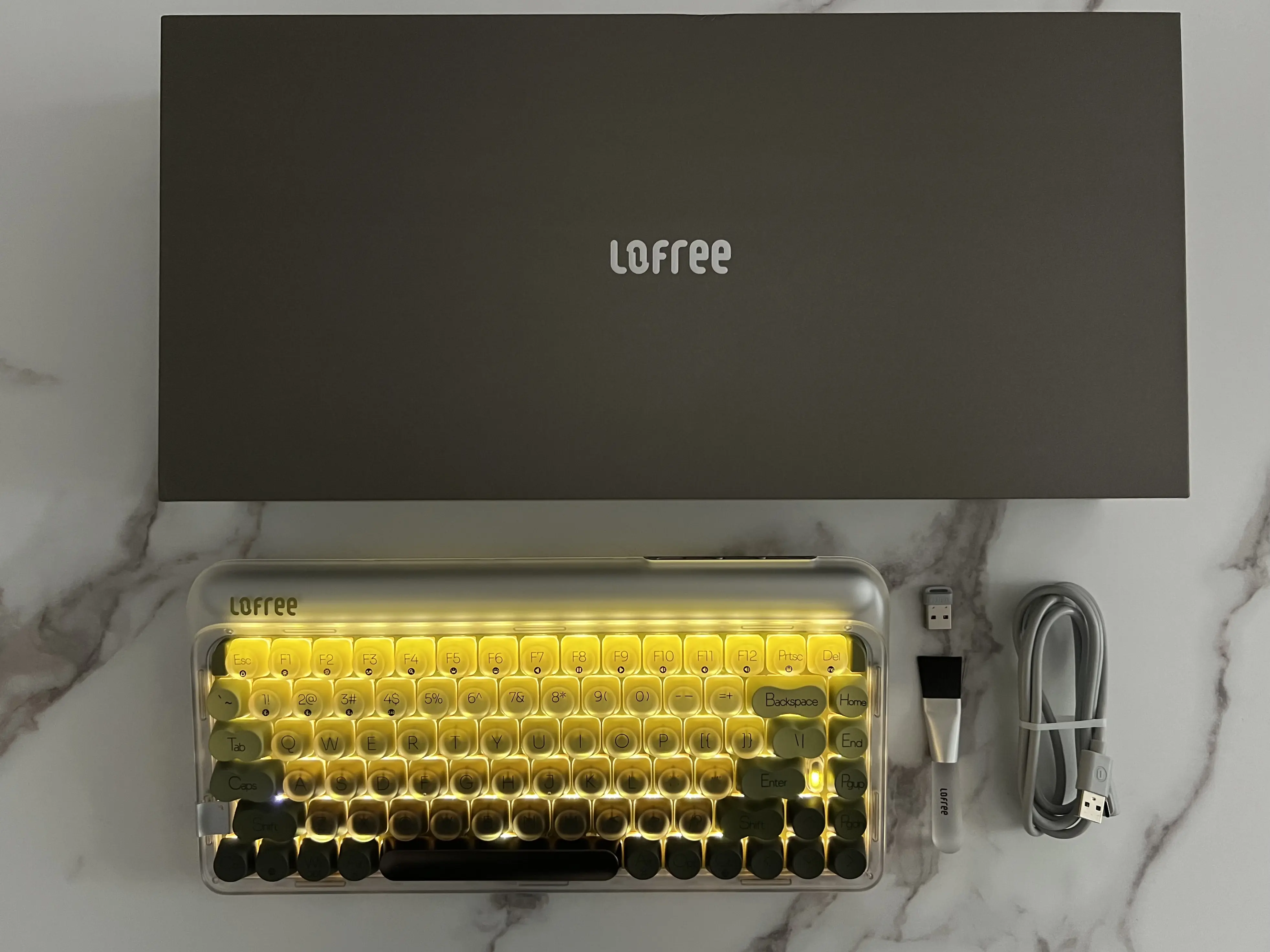 Clavier Lofree 432Hz Polar Moss rétroéclairé avec sa boîte, son câble et sa brosse de nettoyage